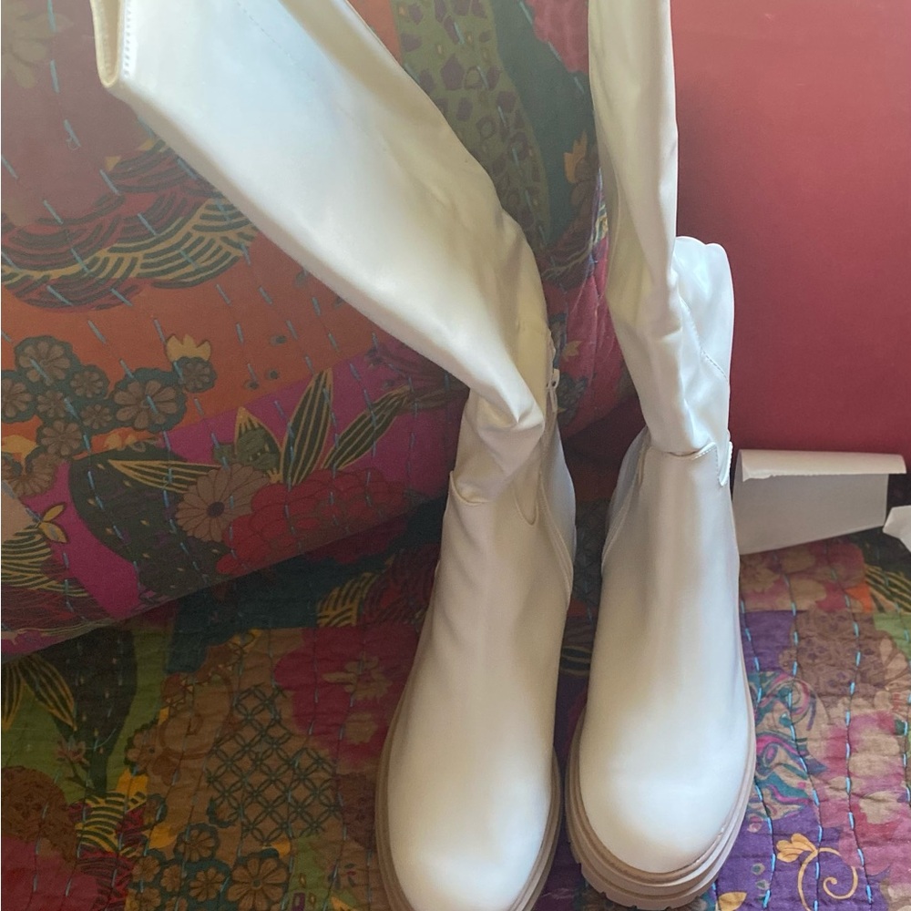 Elegant Cream Knee High Platform Boot
NWOB